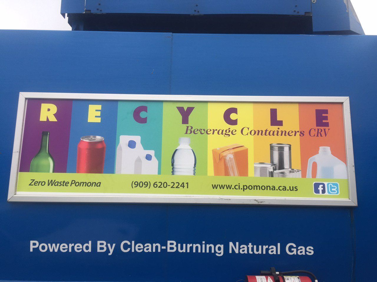 Colorful CRV beverage container recycling panel on a City of Pomona refuse vehicle